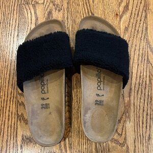 Papillio Black Fuzzy Slide Sandals. Birkenstock footbed